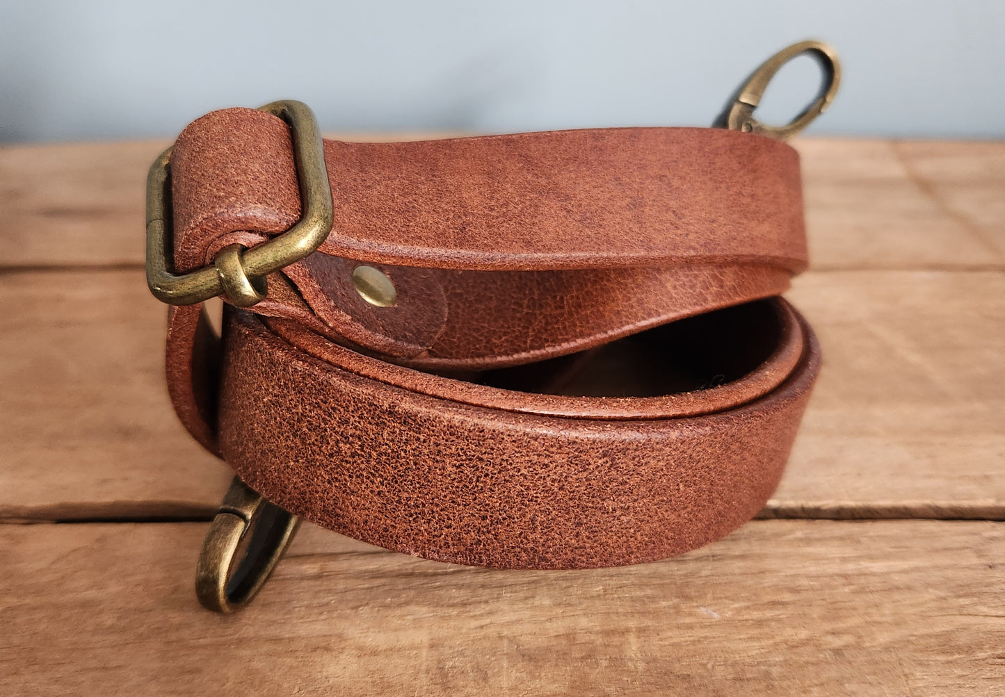 Smooth black leather large sling bag