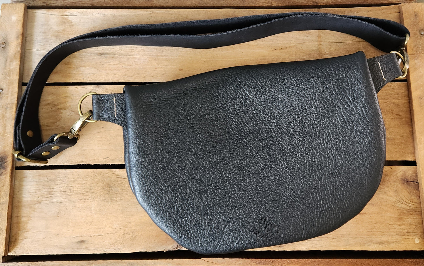 Soft textured black large sling bag