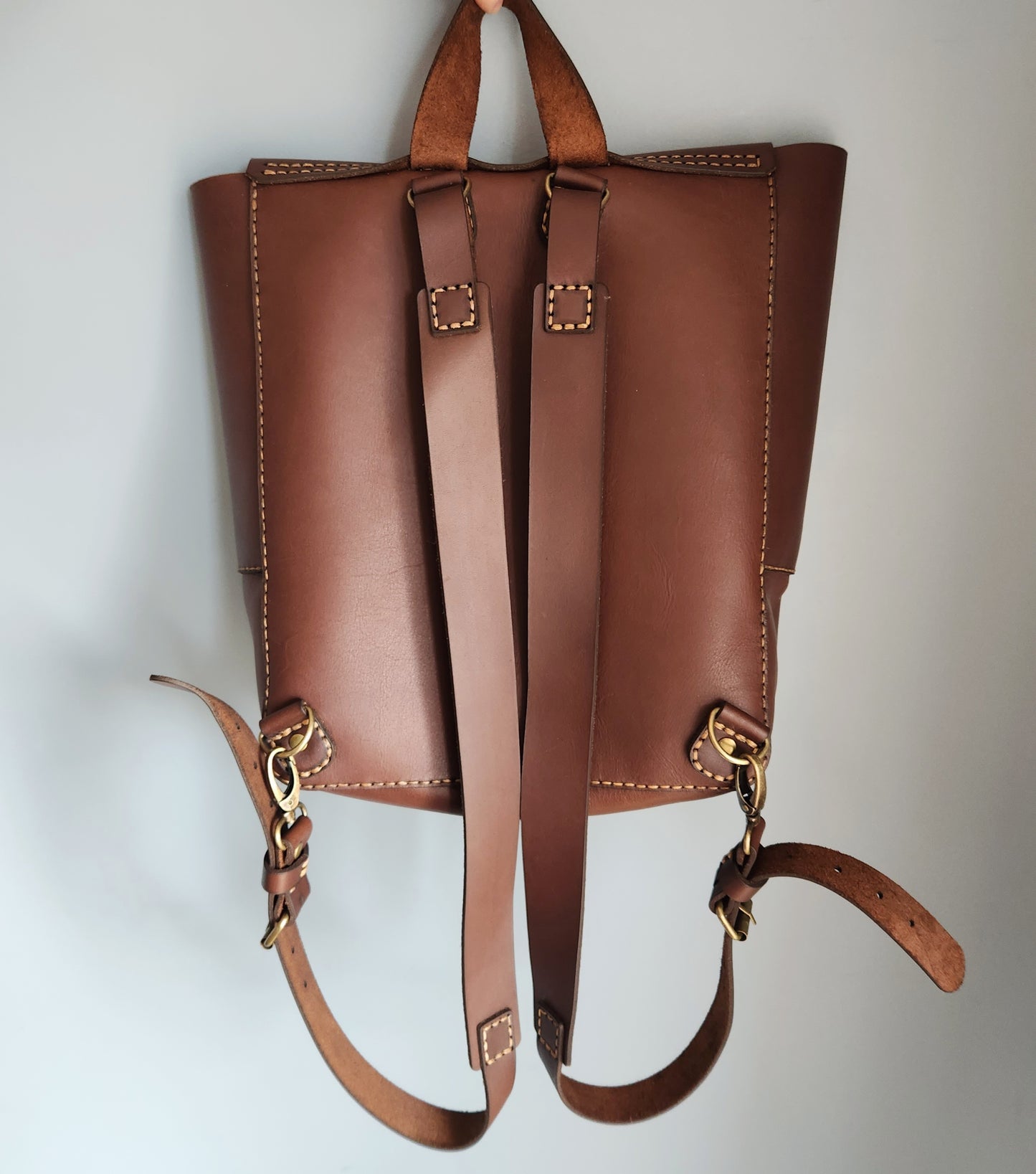 Dark brown medium backpack with pocket